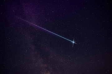 Wall Mural - Picturesque view of shooting star in night sky