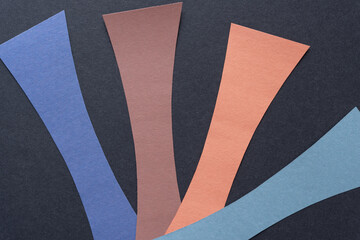 Poster - construction paper stripes with concave profile on black paper