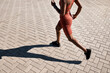 © C Malambo/peopleimages.com - Running, runner and woman with fitness in city, training for marathon and exercise with cardio workout in Seattle. Urban, run outdoor with health and wellness, active life and athlete shadow in sport