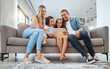© Delcio F/peopleimages.com - Happy family, tablet and sofa with children for movie, games and online video watch together with love, care and home education in living room. Diversity parents with kids on digital technology app