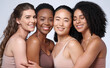 © N F/peopleimages.com - Face portrait, beauty and group of women in studio on gray background. Cosmetics, makeup and diversity of female models with glowing and flawless skin after spa facial treatment posing for skincare.
