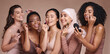 Face, skincare makeup and group of women in studio on a brown background. Beauty portrait, diversity and female models with cosmetics, products or lipstick, jade roller or serum, lip gloss or mascara