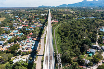 Aerial top view of Elevated railway at Muak Lek the highest in Thailand. Elevated approach bridges height 50 meters and rural landscape in autumn. Amphoe Muak Lek, Saraburi, Thailand.