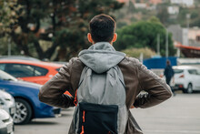 Man On The Street With Backpack On His Back