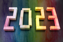 Happy New Year 2023 Idea. Transition From 2022 To New Year 2023 Concept With Text On Wooden Blocks. Creative Concept. 