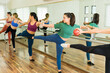 © AntonioDiaz - Active women taking a barre class and working out