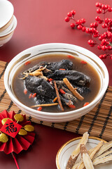 Wall Mural - Delicious silky chicken soup with Chinese herbal medicine