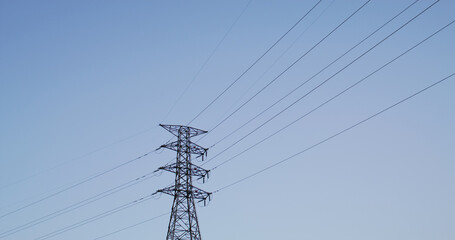 Wall Mural - High voltage tower over the blue sky