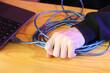 © Wojciech Boruch - pulling with force the usb cable from the laptop on the table