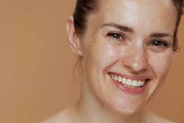 happy young woman with wet face washing