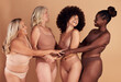 © David L/peopleimages.com - Support, love and diversity of women in underwear, beauty collaboration and smile for body positivity against brown studio background. Community, care and model people with solidarity and confidence
