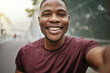 © S Fanti/peopleimages.com - Fitness, portrait or black man taking a selfie in a city for social media marketing online content or running exercise blog. Face, pictures or happy African runner smiles with pride or freedom