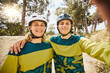 © Clement C/peopleimages.com - Fitness, forest or cycling friends take a selfie in nature with happy smiles on their faces for social media. Sports, portrait or healthy young men take pictures on fun adventure on holiday vacation