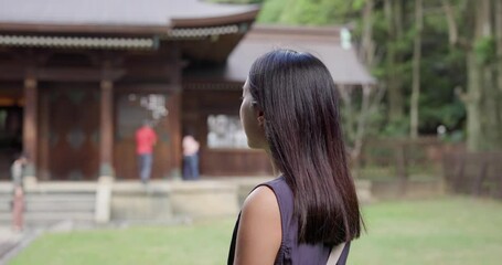 Canvas Print - Woman visit Japanese wooden house architecture