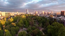 Aerial View Dolly In Of The Bellas Artes Neighborhood With The Forestal Park, Residential Area Of Downtown Santiago, Cloudy Sunset, Chile.