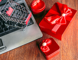 Online sell of gift boxes or merchandise boxes Black Friday sale elements composed on black background