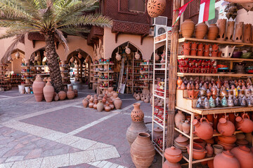 Omani Souvenirs. Hand Made Pottery in Nizwa Market. Clay Jars at the Rural Traditional Arabic Bazaar, Oman. Arabian Peninsula. 