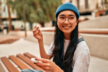 Asian female tourist student on city streets