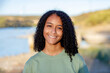 © Gelpi - Happy black woman on holiday in the countryside for adventure, peace and calm in summer.