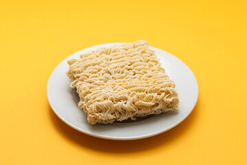 dry fresh noodle cubes on white dish