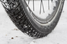 Winter Tires With Studs, Safe Cycling In The Cold Season When Snow And Ice Cover The Roads.