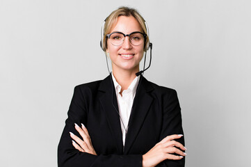 Wall Mural - pretty caucasian blonde businesswoman real state agent with headset