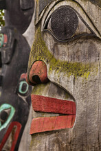 Close Up Of A Native American Memorial Totem Pole.