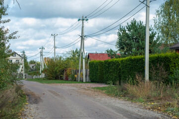 Power electric pole with line wire on colored background close up, photography consisting of power electric pole with line wire under sky, line wire in power electric pole for residential buildings