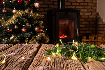 Poster - christmas decorations on wooden background fireplace