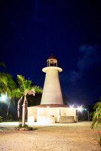 Lighthouse At Night In Coyuca Lagoon With Palme Trees, Pie De La Cuesta Acapulco, Guerrero 