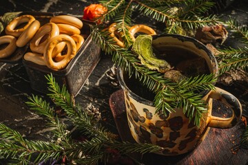 Wall Mural - Still life- medicinal tea is a forest medicine from the polypore mushroom. Dark background- photo clipart