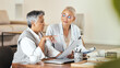 © Rene L/peopleimages.com - Partnership, documents and elderly women partners in office for planning, thinking and financial review. Business people, owner and senior b2b proposal with paper, research and budget analysis