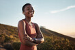 © C Malambo/peopleimages.com - Portrait, black woman and arms crossed outdoor, exercise or fitness for wellness, health or smile. Nigerian female, girl and athlete rest, nature and workout for training, sports or practice to relax