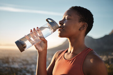 Poster - Water, hydration and black woman running in nature, fitness rest and health for exercise in Turkey. Energy, break and training African runner drinking water for body detox during an outdoor workout