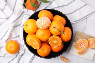 Wall Mural - Fresh juicy tangerines on white marble table, flat lay