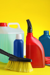 Wall Mural - Different car cleaning products on yellow background