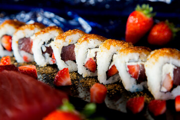 Wall Mural - Tuna uramaki with strawberry in Japanese restaurant. 