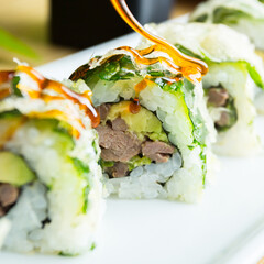 Wall Mural - Sushi roll with chicken and vegetables served in a Tokyo restaurant.