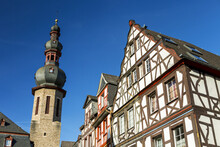 Old Medieval Building Fronts With Tall Stone Church Tower And Blue Sky; Cochem, Germany