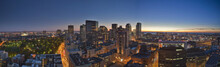 Panoramic View Of Sunrise In Downtown Boston With Boston Harbor, Cambridge And Boston Common And Tremont Street Lit Up, Boston, Suffolk County, Massachusetts, USA