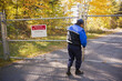 © Designpics - Security guard opening a gate