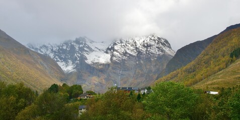 Wall Mural - Scenery of snow-capped mountains in autumn in Norway