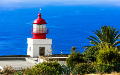 Wall Mural - Madeira island scenic places. Lighthouse with stunning ocean view in Ponta do Pargo