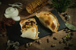 © ADDICTIVE STOCK - Delicious argentinian empanadas served on table in kitchen