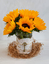 Sunflower Bouquet In A Decorative Jar With Lace, Pearls And A Vintage Key; Surrey, British Columbia, Canada