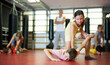 © JackF - Boys and girls in gym exercising armlock move during group self-defence training.