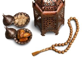 Wall Mural - Arabic lantern and plate with date fruits on the table