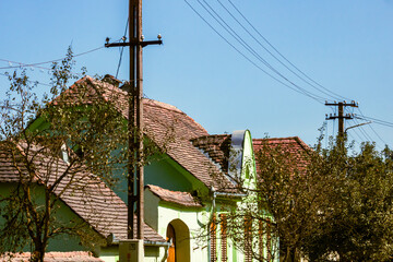 Wall Mural - View of picturesque village Viscri in Romania. Painted traditional old houses in medieval Saxon village of Viscri, Romania, 2021