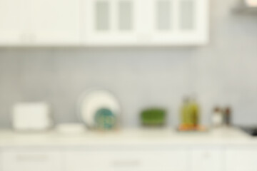 Poster - Blurred view of modern kitchen. Interior design