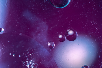 Abstract gradient blurred background in purple tones. Geometric shapes balls of different sizes. fantastic picture of space. macro photo, selective focus 